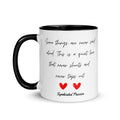 A Quiet Love black colored rim ceramic coffee mug — elegant black handwritten script with two bold red hearts and Syndicated Passion signature, original love poetry reads Some things are never said aloud, This is a quiet love that never shouts and never taps out by Syndicated Passion.