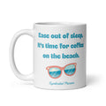 Beach Coffee white glossy ceramic coffee mug — bold teal retro typography with pink sunglasses reflecting ocean waves and clouds, original beach poetry reads Ease out of sleep, It's time for coffee on the beach by Syndicated Passion.