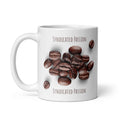 A white ceramic coffee mug featuring a graphic of roasted coffee beans with the words 'SYNDICATED PASSION' printed above and below, shown on a clean white background.