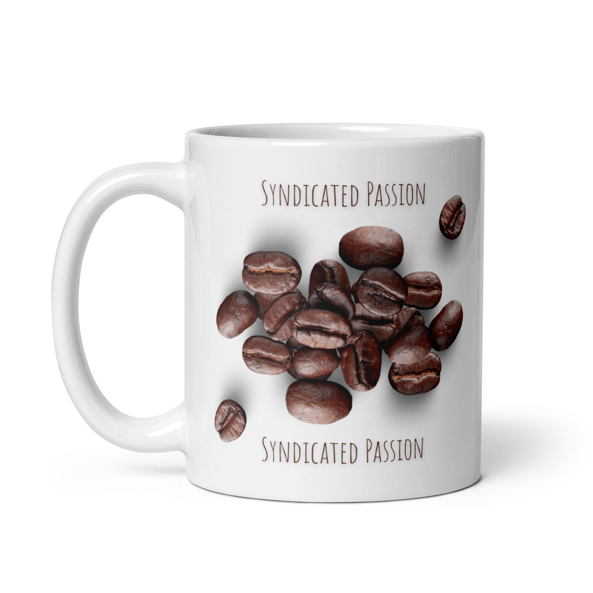 A white ceramic coffee mug featuring a graphic of roasted coffee beans with the words 'SYNDICATED PASSION' printed above and below, shown on a clean white background.