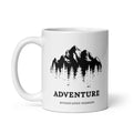 White ceramic coffee mug featuring black-and-white mountain peaks and evergreen trees above “ADVENTURE” lettering and Syndicated Passion branding.