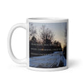 White coffee mug featuring a snowy country road lined with trees and original Winter Glee poetry by Syndicated Passion®.