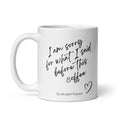 White coffee mug with black “I am sorry for what I said before this coffee” script, an outlined heart, and Syndicated Passion branding.